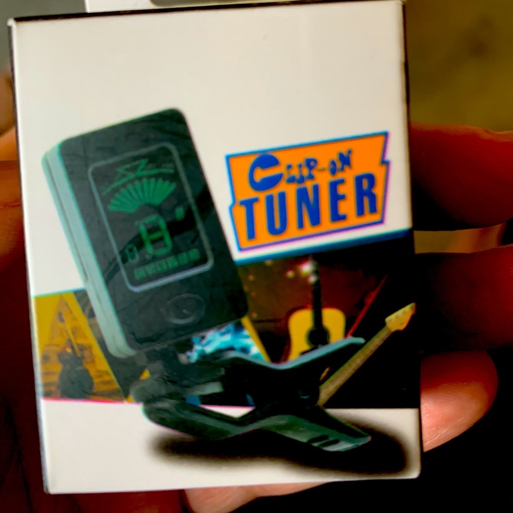 Guitar Tuner: Helps tune guitar